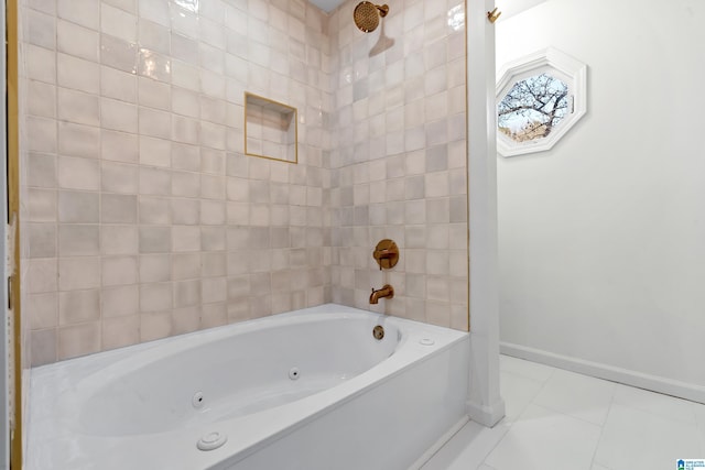 bathroom with tile patterned floors and tiled shower / bath combo