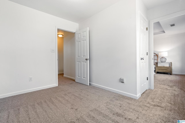 spare room with carpet floors