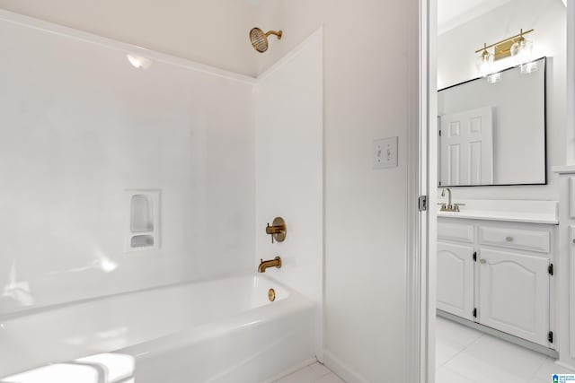 bathroom with tile patterned flooring, vanity, and shower / bathing tub combination