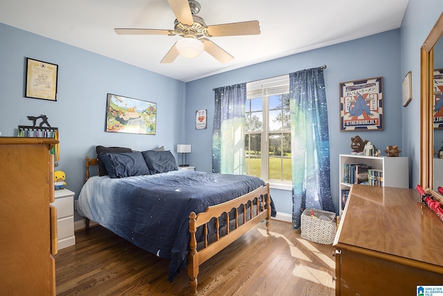 bedroom with wood-type flooring and ceiling fan