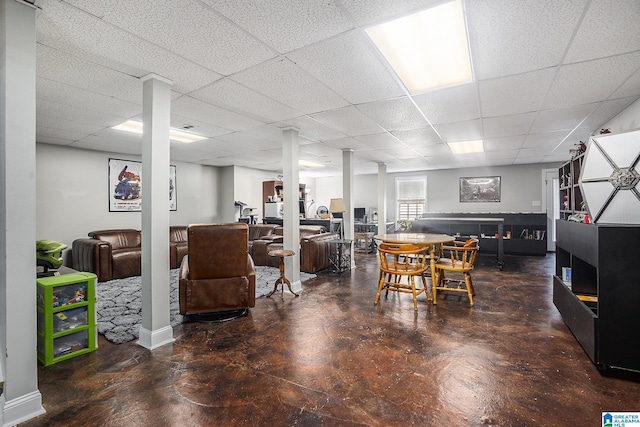 dining area featuring a paneled ceiling