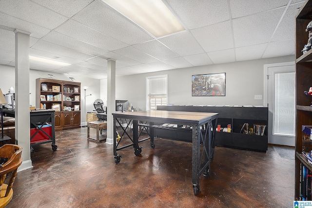 playroom with a paneled ceiling