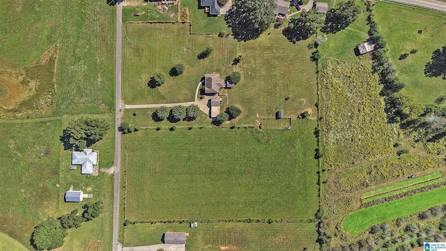 birds eye view of property featuring a rural view