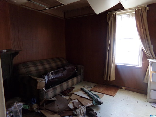 bedroom with wood walls