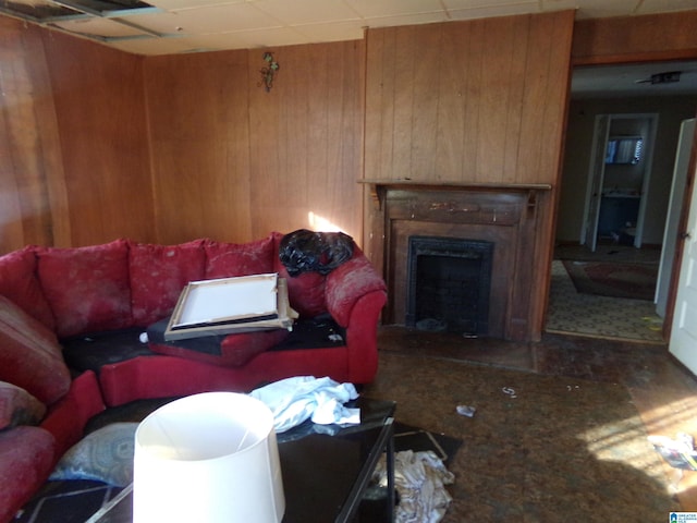 living room featuring wooden walls