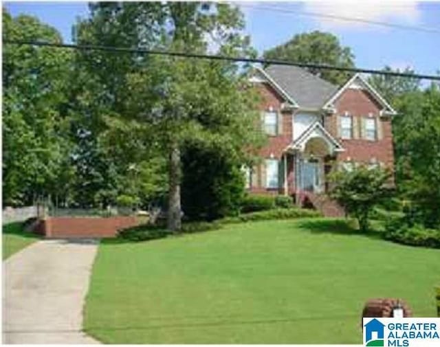 view of front of home with a front yard