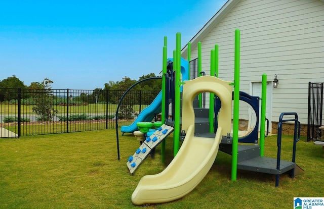 view of jungle gym with a lawn