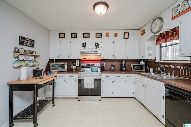 kitchen with stainless steel appliances, tasteful backsplash, sink, and white cabinets