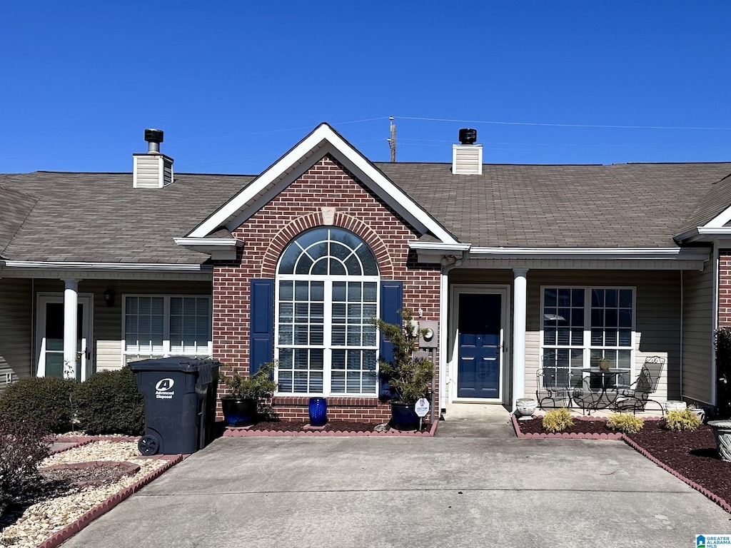 doorway to property with a porch