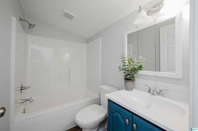 full bathroom featuring tub / shower combination, toilet, and vanity