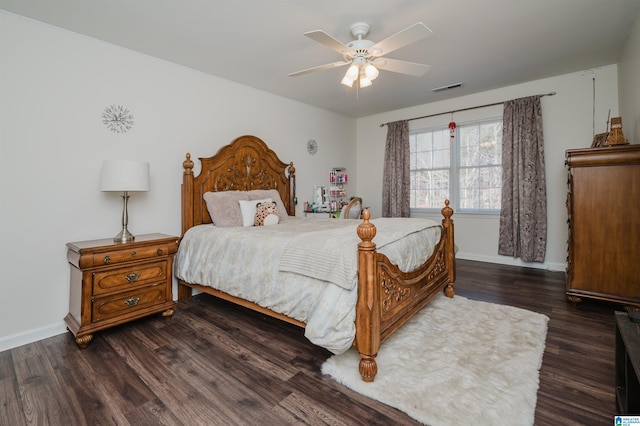 bedroom featuring dark hardwood / wood-style floors and ceiling fan