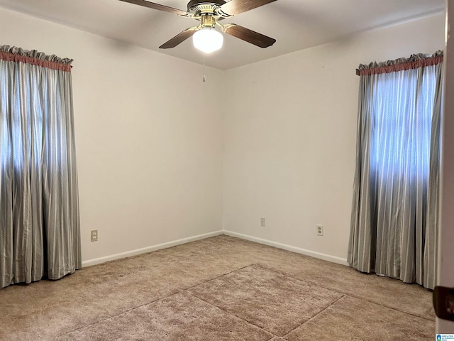 empty room featuring ceiling fan