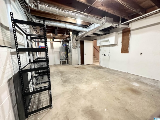 basement featuring water heater