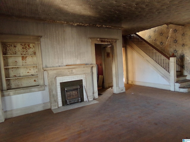 unfurnished living room featuring hardwood / wood-style flooring