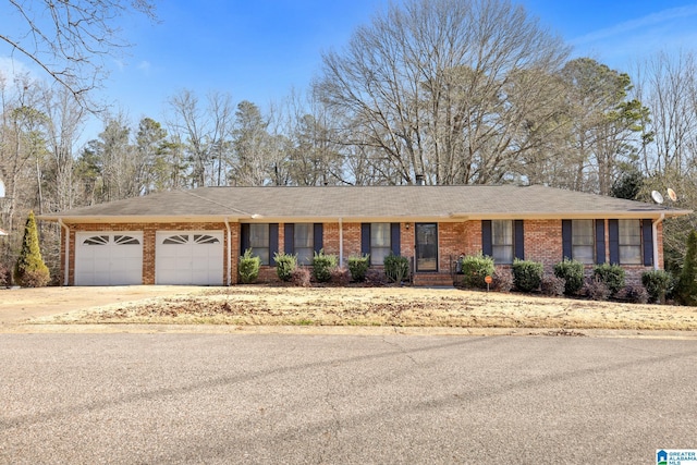 ranch-style home featuring a garage