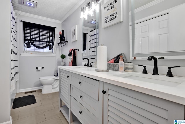 bathroom with crown molding, tile patterned flooring, toilet, a textured ceiling, and vanity