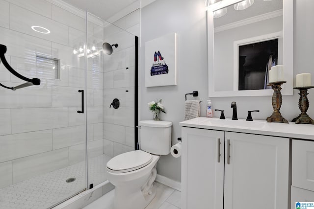 bathroom featuring a shower with door, toilet, vanity, and ornamental molding