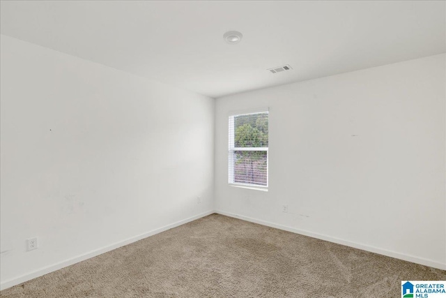 view of carpeted spare room