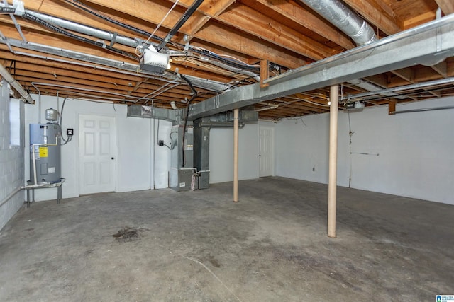 basement with heating unit and water heater