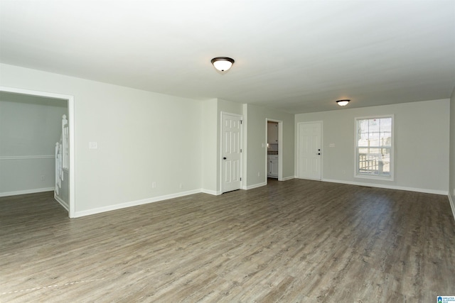 empty room featuring wood-type flooring