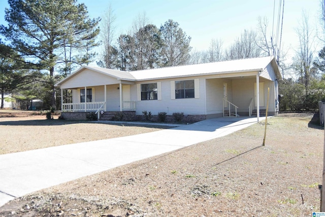 ranch-style home featuring covered porch