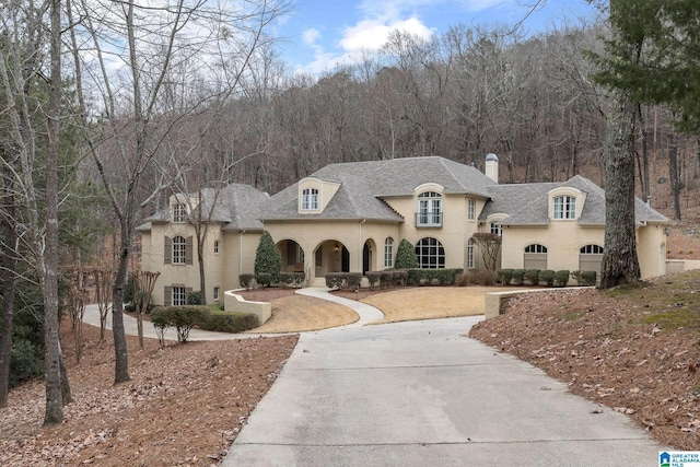 view of french country style house