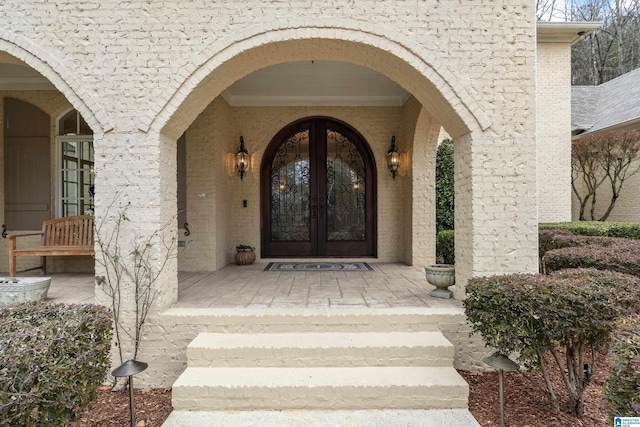 view of exterior entry with french doors