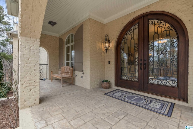 property entrance featuring french doors