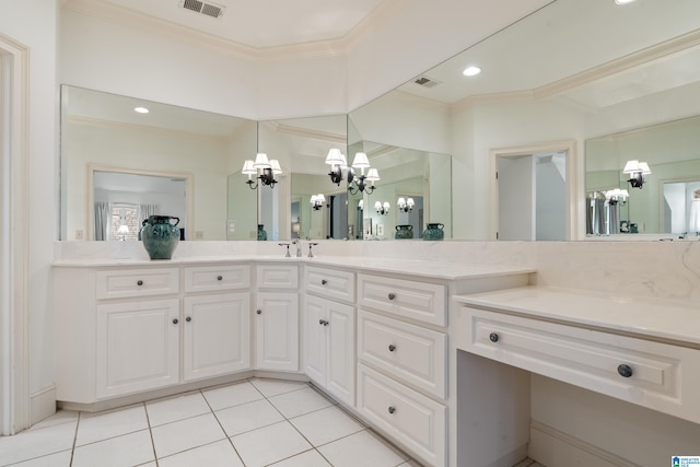 bathroom featuring tile patterned floors, vanity, ornamental molding, and a notable chandelier