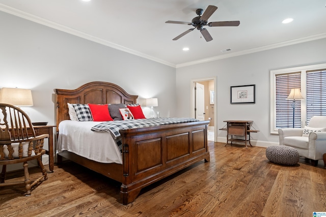 bedroom with ceiling fan, dark hardwood / wood-style flooring, ensuite bath, and ornamental molding