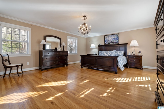 bedroom featuring crown molding, light wood-type flooring, and an inviting chandelier