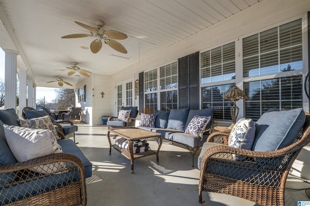 view of patio featuring ceiling fan and outdoor lounge area