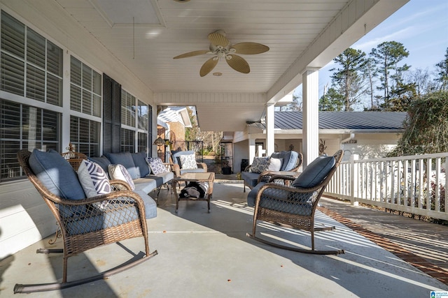 view of patio / terrace featuring ceiling fan and an outdoor living space