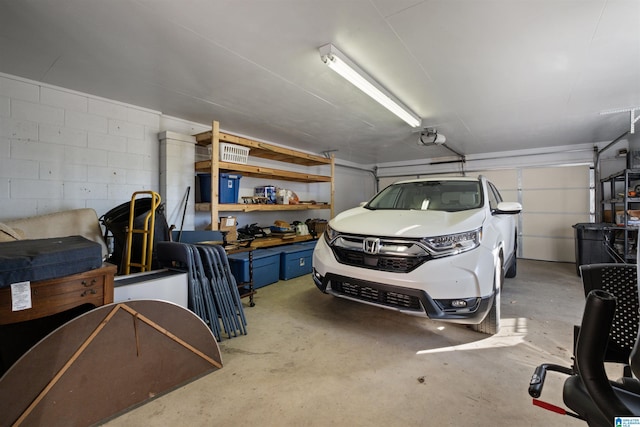 garage featuring a garage door opener