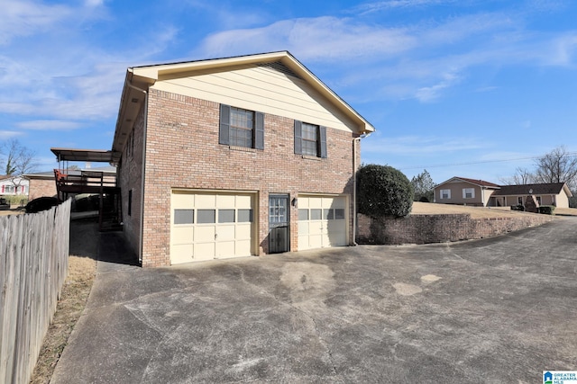 view of property exterior featuring a garage