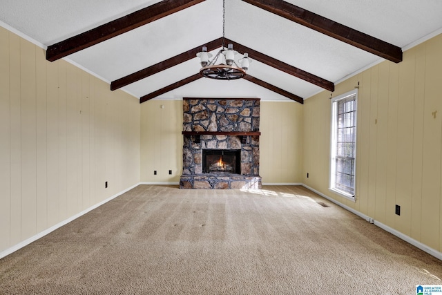 unfurnished living room with a stone fireplace, lofted ceiling with beams, carpet flooring, a notable chandelier, and a textured ceiling