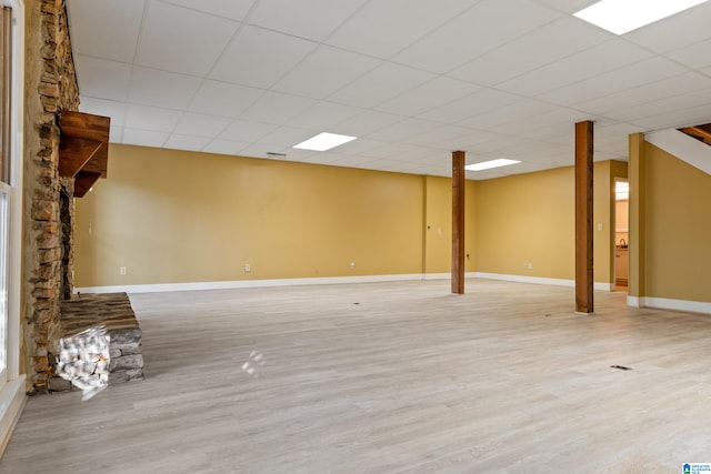 basement featuring light hardwood / wood-style flooring