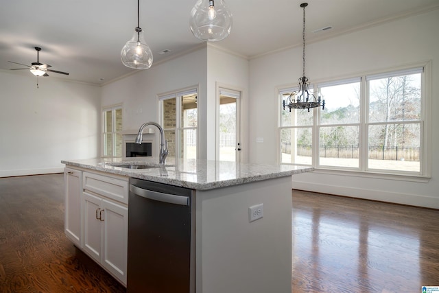 kitchen with white cabinetry, a kitchen island with sink, stainless steel dishwasher, sink, and light stone counters