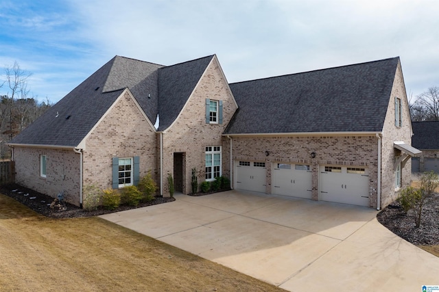 view of front facade featuring a garage and a front lawn