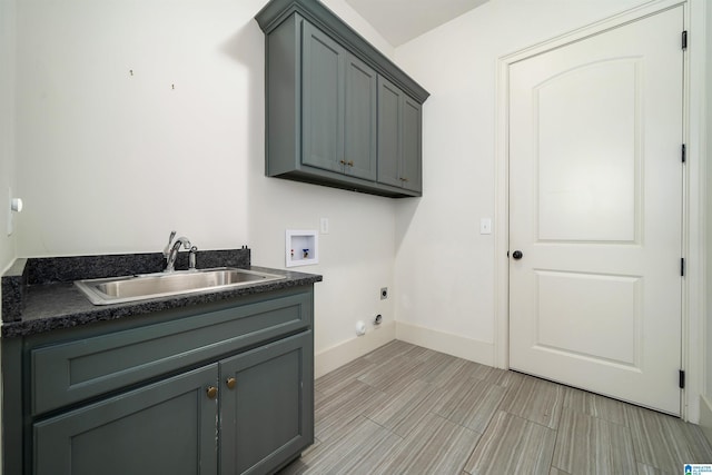 laundry room with washer hookup, sink, cabinets, and electric dryer hookup