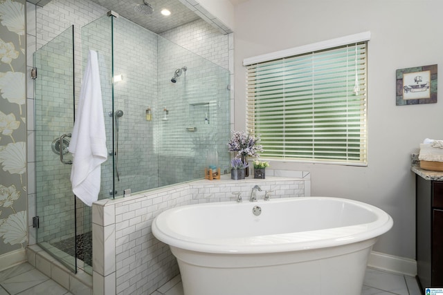 bathroom with independent shower and bath and tile patterned floors