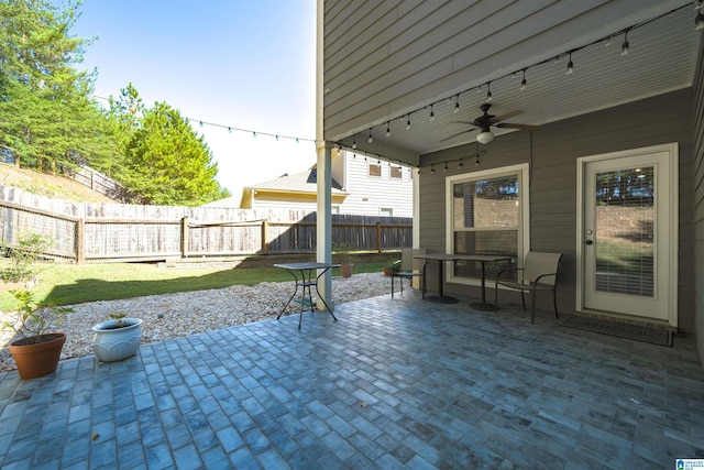 view of patio / terrace featuring ceiling fan