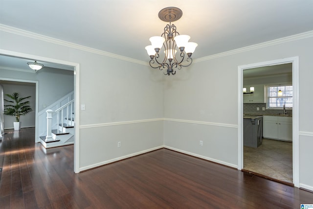 unfurnished room featuring an inviting chandelier, dark wood-type flooring, and ornamental molding