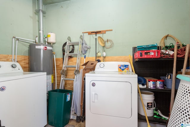 laundry area featuring washing machine and clothes dryer