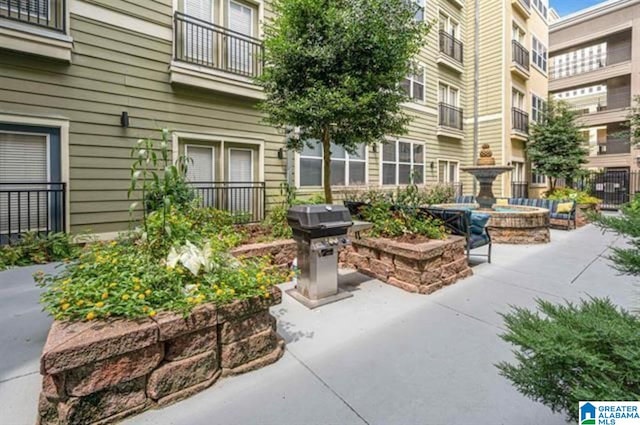 view of community with a patio area