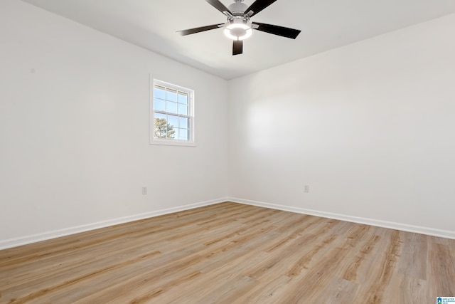 empty room with light hardwood / wood-style floors and ceiling fan