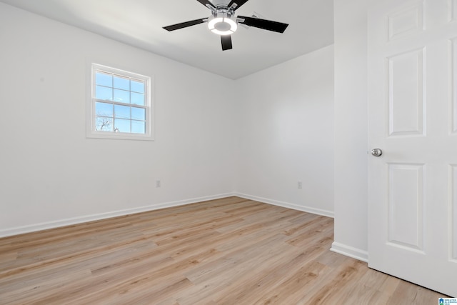 unfurnished room featuring light hardwood / wood-style floors and ceiling fan