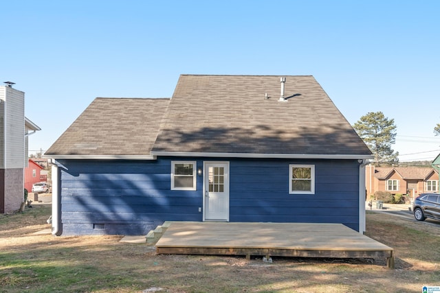 rear view of house with a deck