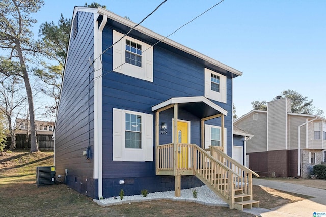 view of front of property with central AC unit