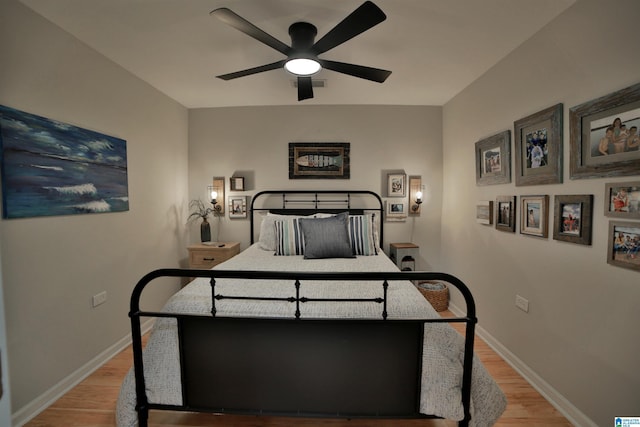 bedroom featuring ceiling fan and light wood-type flooring